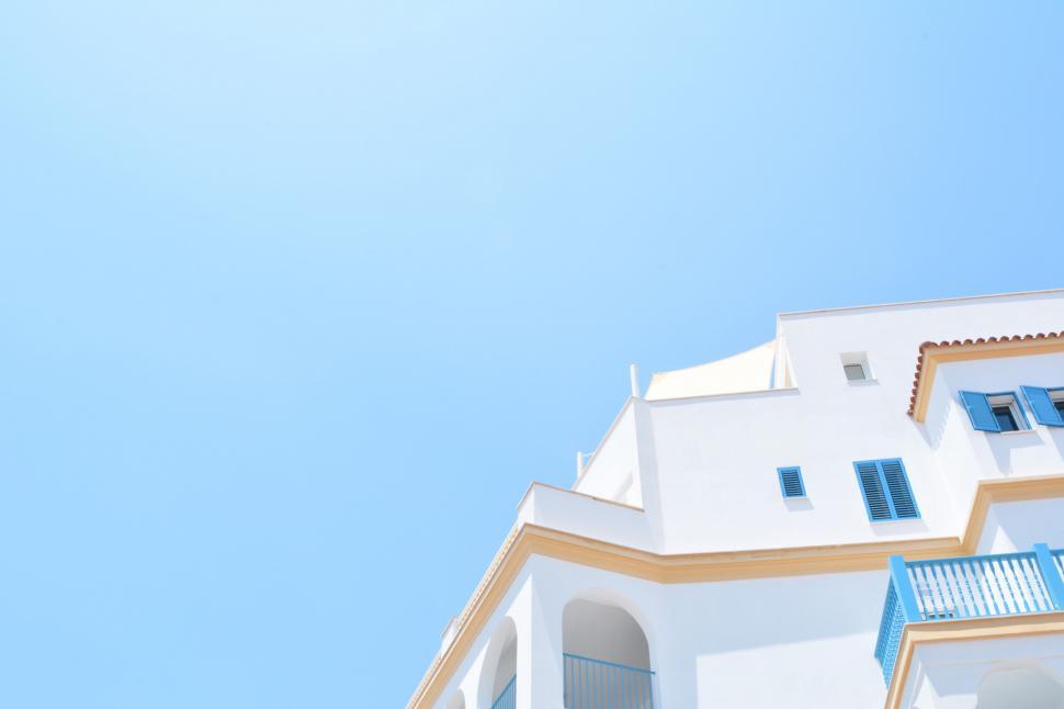Free Image of Low angle view of a white building against sky 