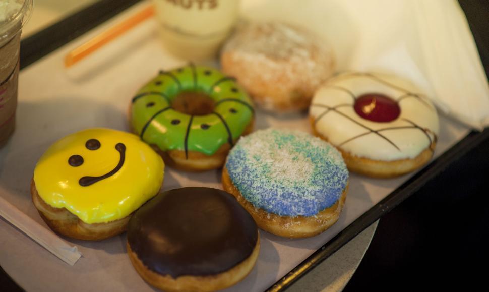 Free Image of Assorted colorful donuts on a tray 