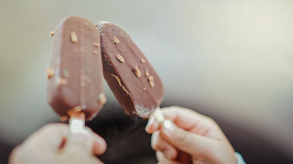 Free Image of Two chocolate ice creams in summer light 