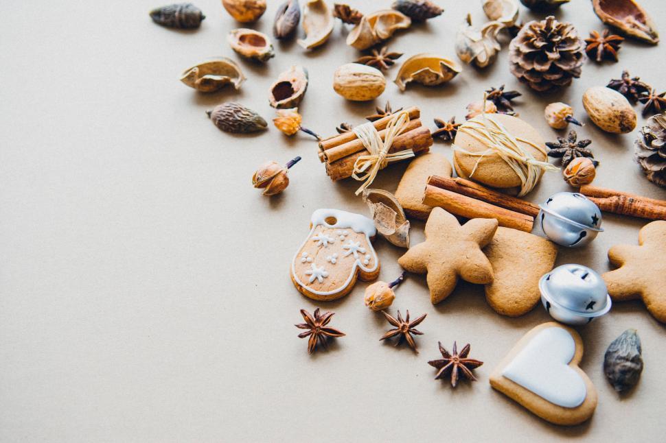 Free Image of Variety of cookies and spices scattered on beige 