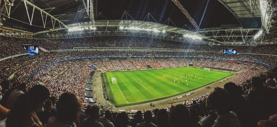 Free Image of Stadium filled with spectators enjoying a match 