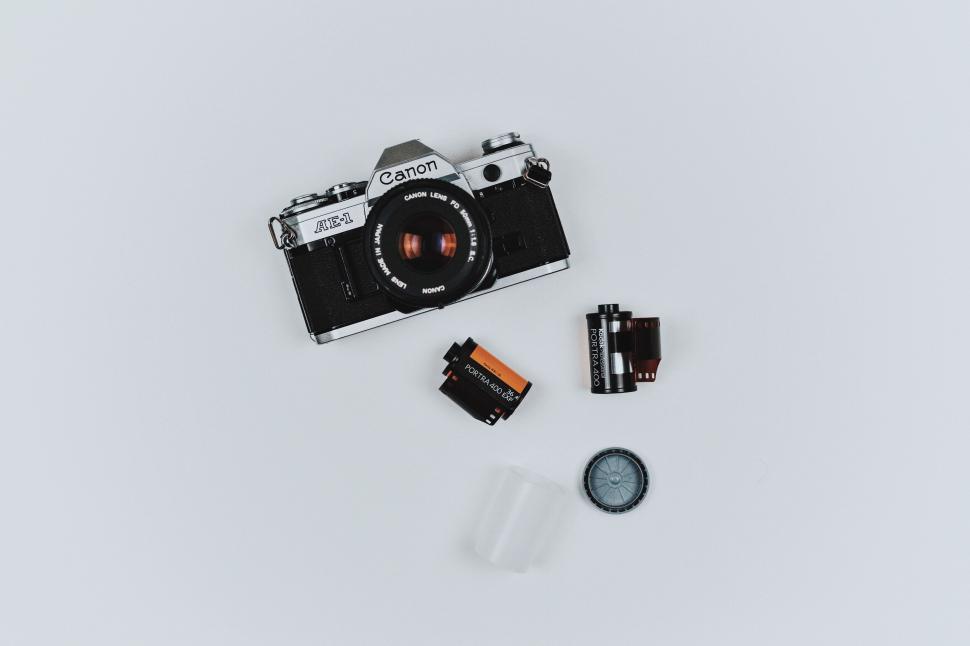 Free Image of Vintage camera and film on white surface 
