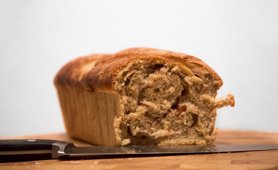 Free Image of A fresh homemade banana bread on a table 