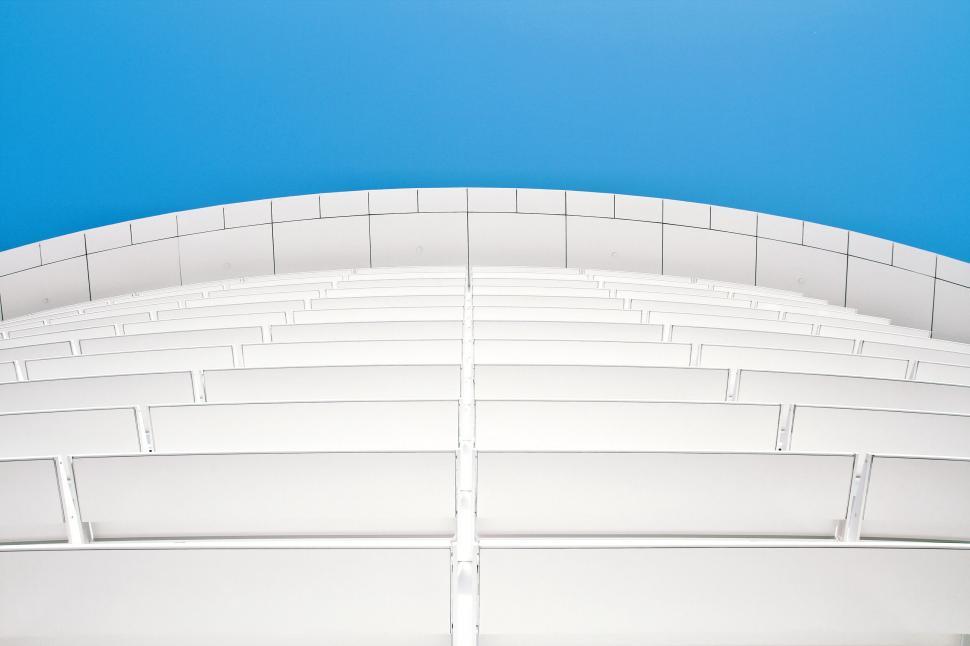 Free Image of Modern architecture curve against blue sky 