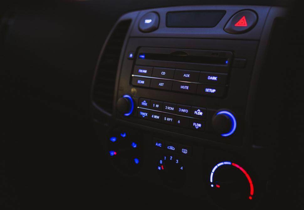 Free Image of Illuminated car dashboard at night 