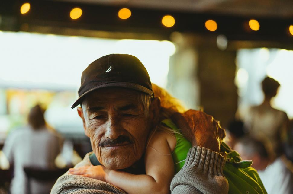 Free Image of Elderly man hugging with emotional bond 