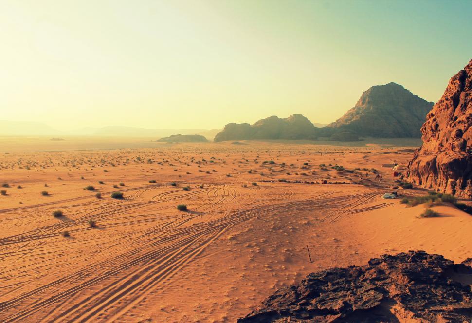 Free Image of Desert landscape with mountain during golden hour 