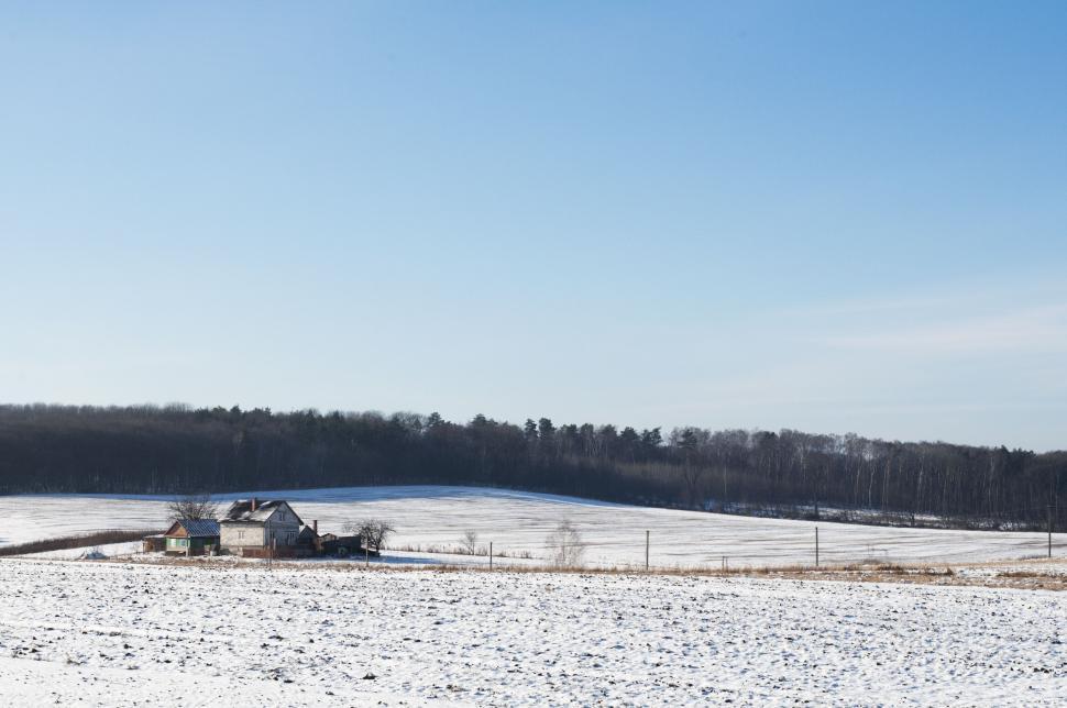 Free Image of Panoramic view of a snowy rural landscape 