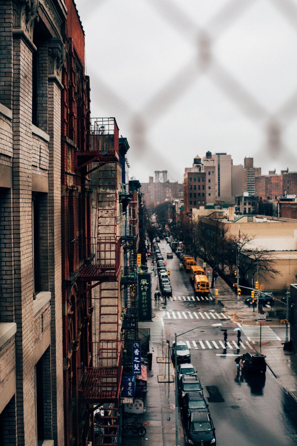 Free Image of Urban street view through a fence blur 