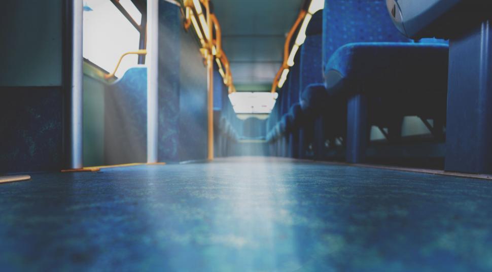 Free Image of Empty bus interior with blue seats 