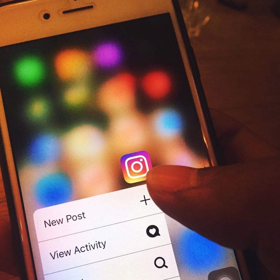 Free Image of Person using Instagram on smartphone 