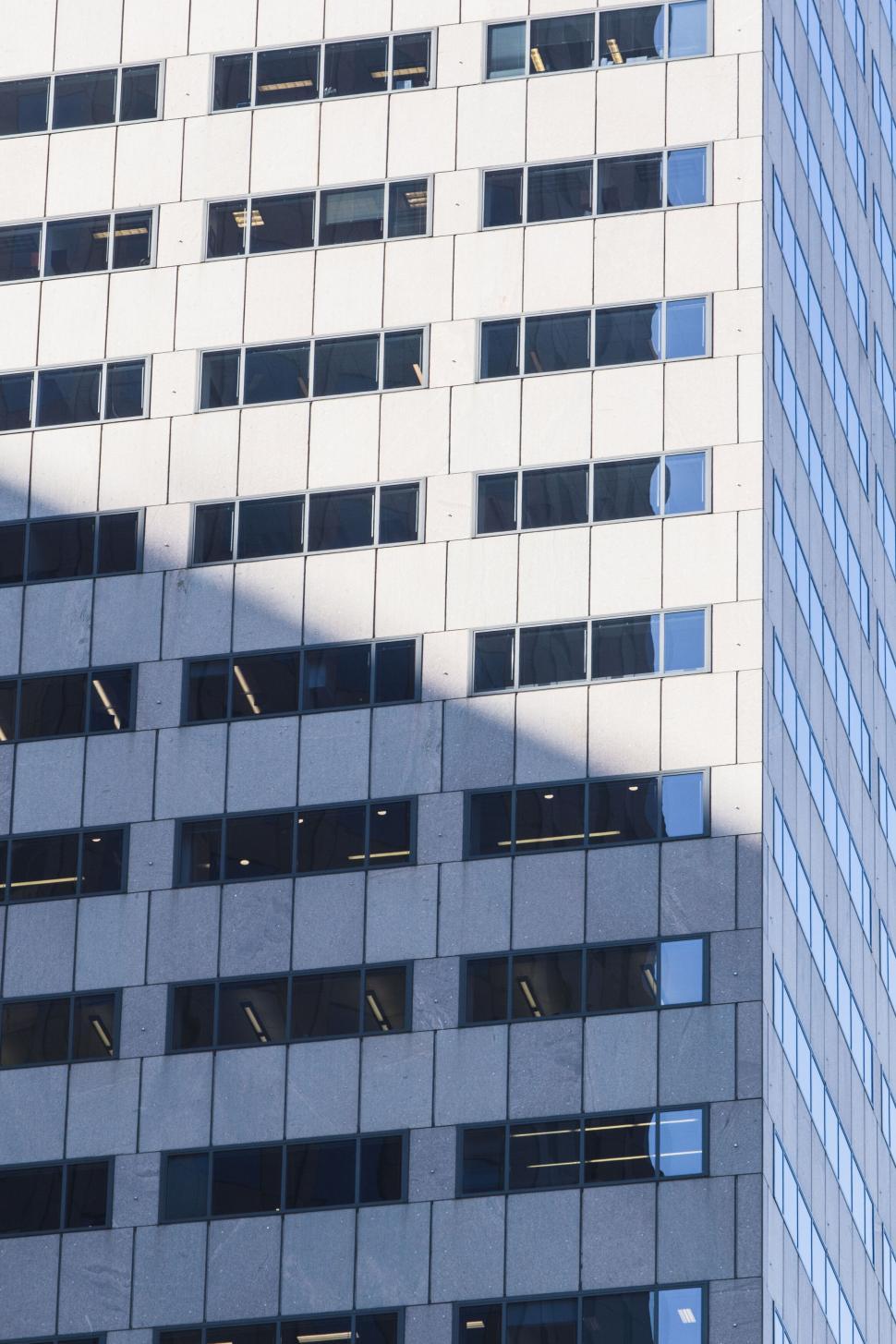 Free Image of Reflections on a corporate skyscraper 