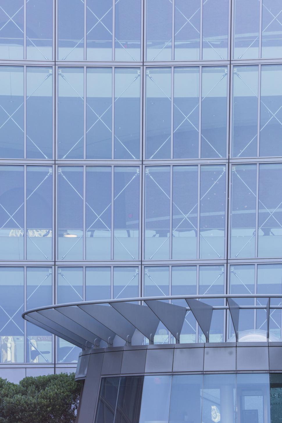 Free Image of Modern glass building facade close-up view 