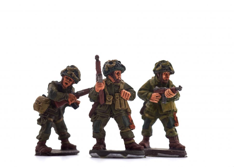 Free Image of Toy soldiers in action pose on white 