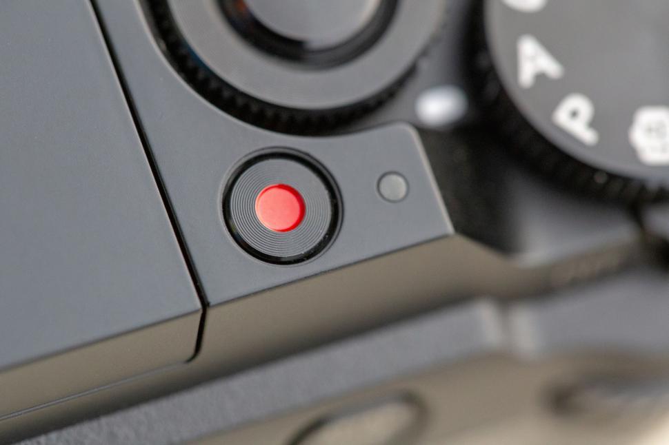 Free Image of Close-up of a camera s red record button 