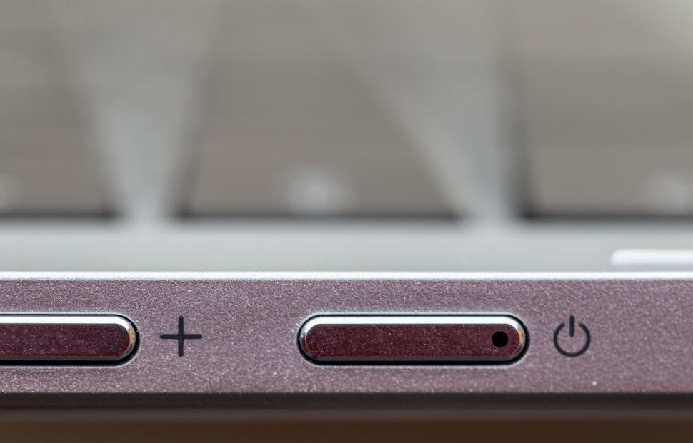 Free Image of Close-up of a laptop s volume and power buttons 