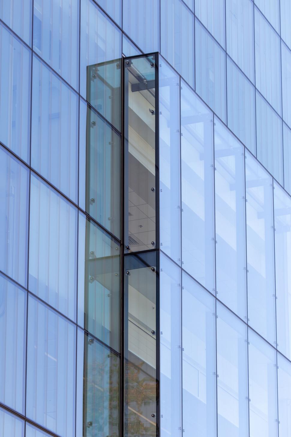 Free Image of Up-close of modern glass building corner junction 