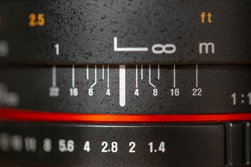 Free Image of Close-up of camera lens focus scale 
