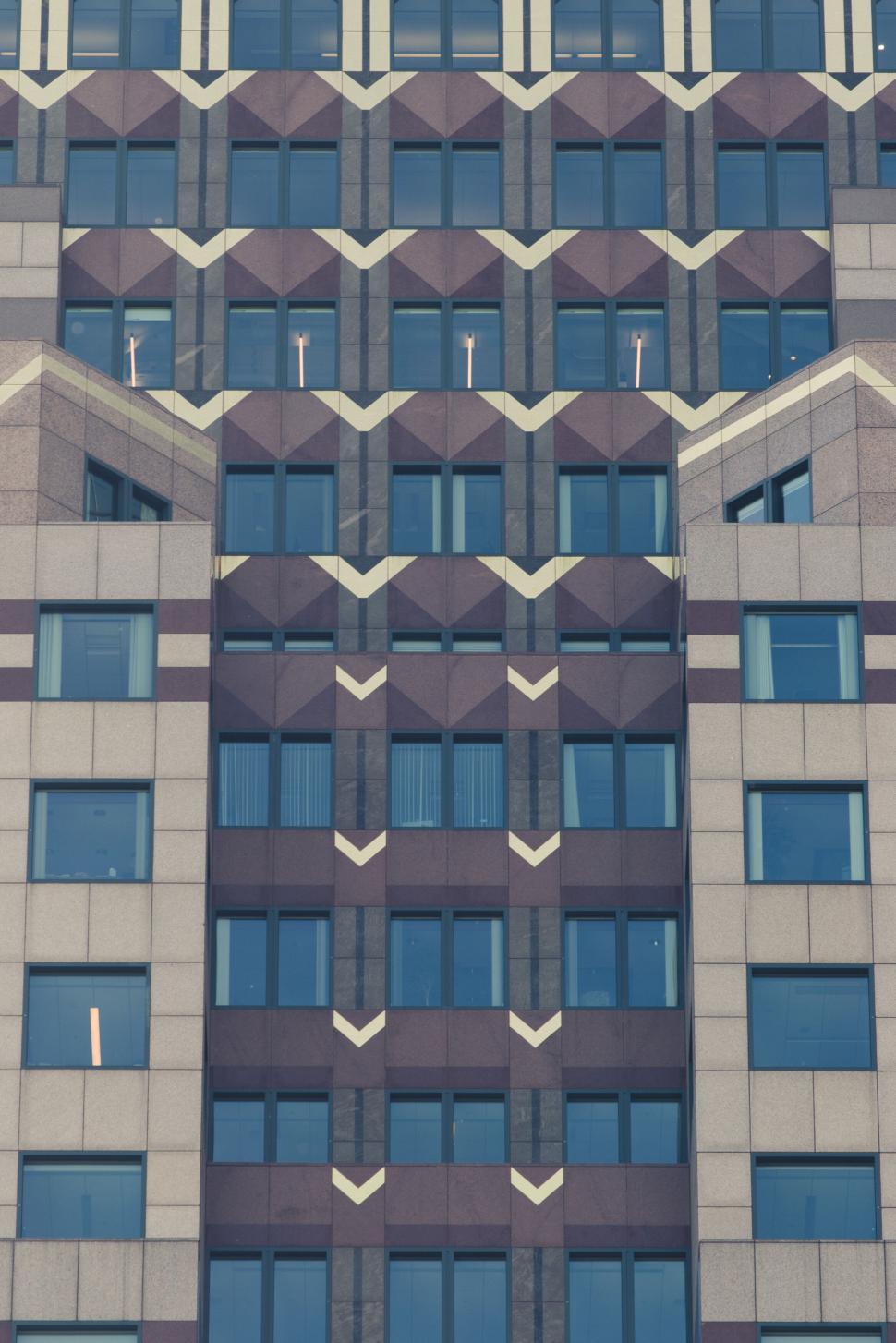 Free Image of Modern commercial building with patterned facade 