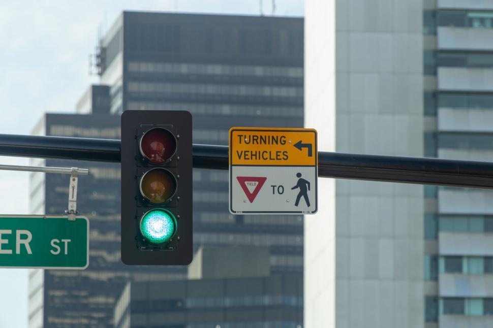 Free Image of Traffic light with green signal in cityscape 