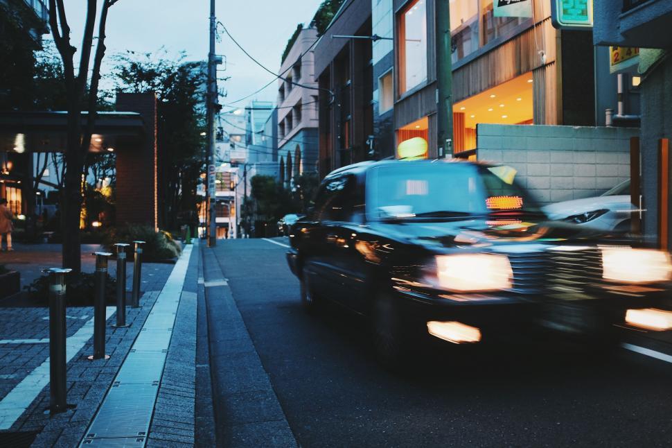Free Image of Fast moving taxi on a Tokyo city evening 