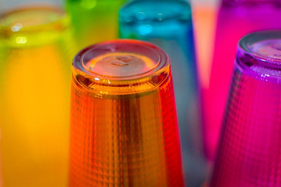 Free Image of Vibrant colored glass bottoms close up 