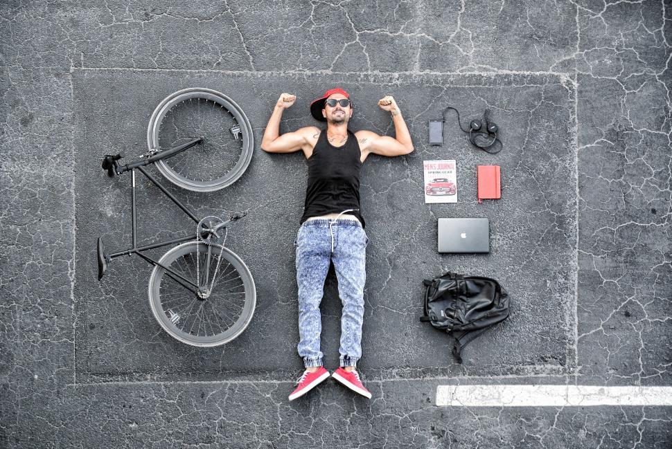 Free Image of Aerial view of person with bicycle and items 