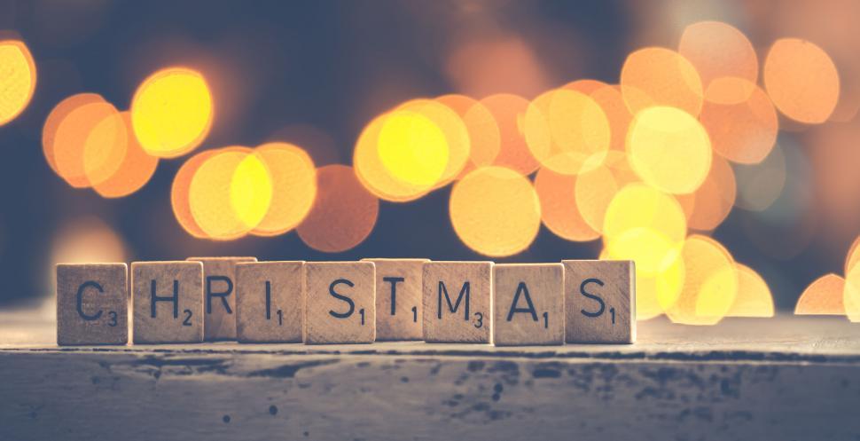 Free Image of Letters spelling Christmas on bokeh background 