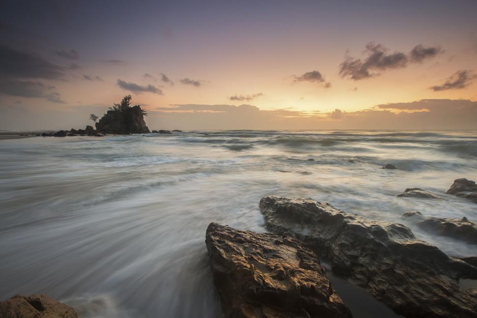 Free Image of Sunset seascape with flowing water 