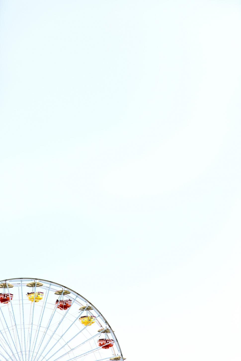 Free Image of Partial view of Ferris wheel against sky 