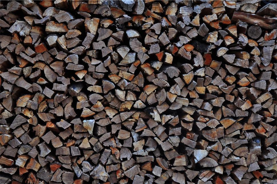 Free Image of Pile of chopped firewood stacked neatly 