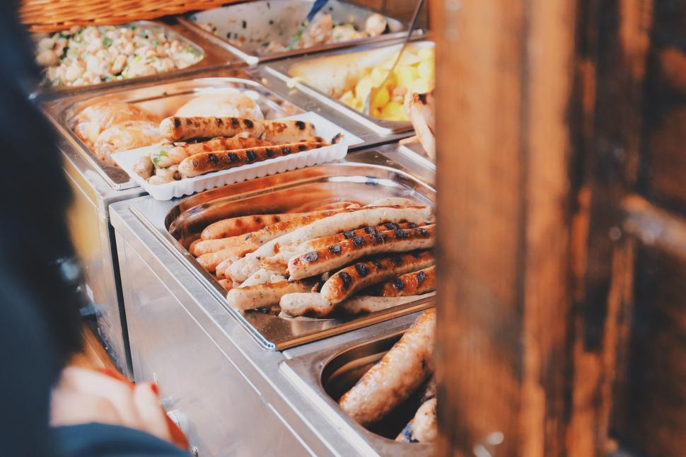 Free Image of Grilled sausages in a street food stall 