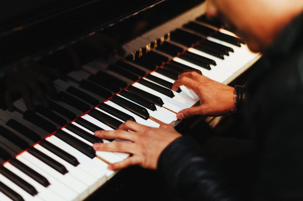 Free Image of Pianist s hands playing the piano 
