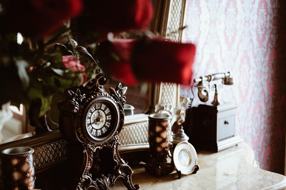 Free Image of Vintage clock on an elegant mantelpiece 