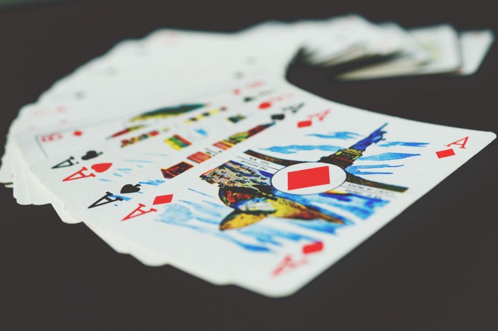 Free Image of Fanned out deck of colorful playing cards 