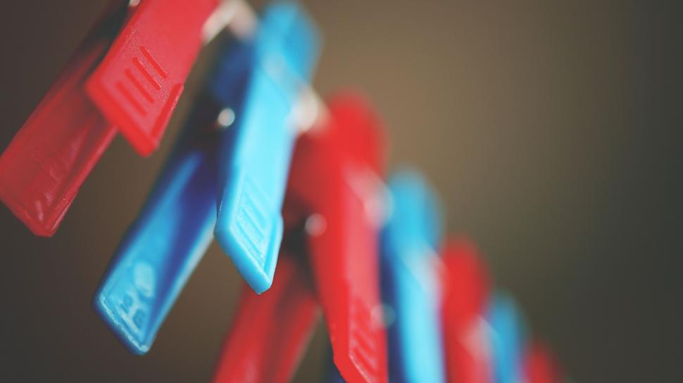 Free Image of Close-up of red and blue clothespins 