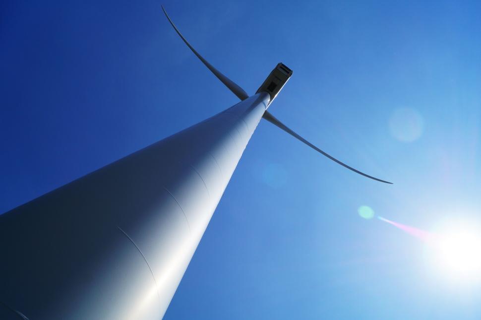 Free Image of Wind turbine against clear blue sky 