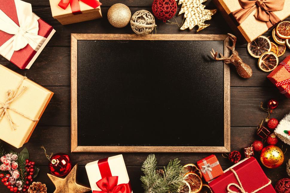 Free Image of Holiday-themed layout with blank chalkboard 
