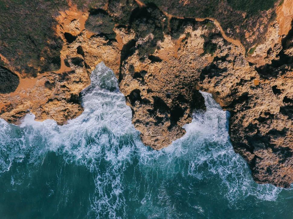 Free Image of Aerial shot of rocky coastline 