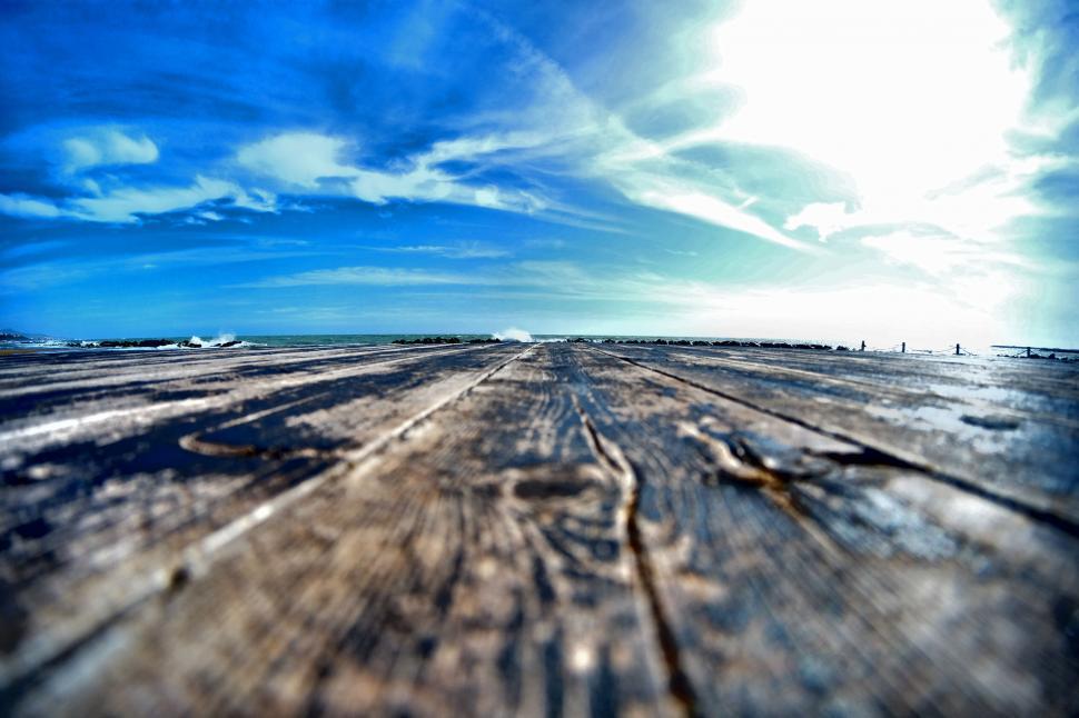 Free Image of Wide angle shot of a wooden pier 