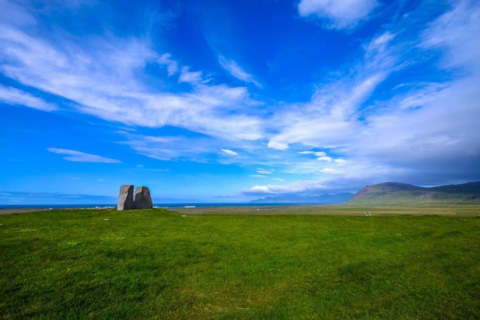 Free Image of Ancient stone structure in green field 