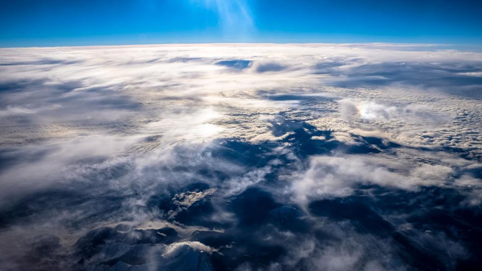 Free Image of Aerial view of cloudscape over mountains 