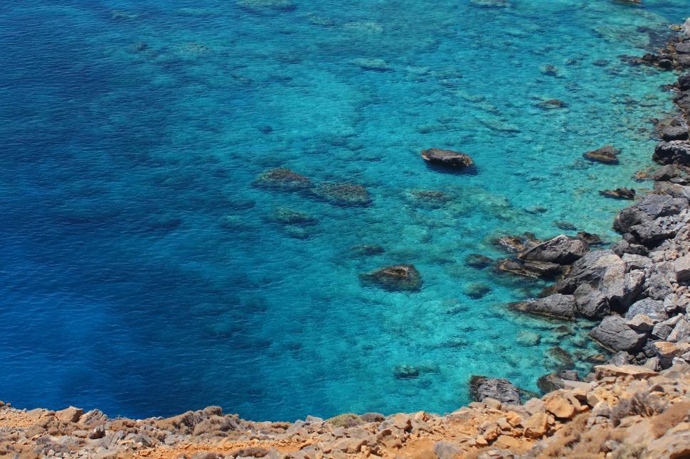 Free Image of Azure waters along rocky coastline 