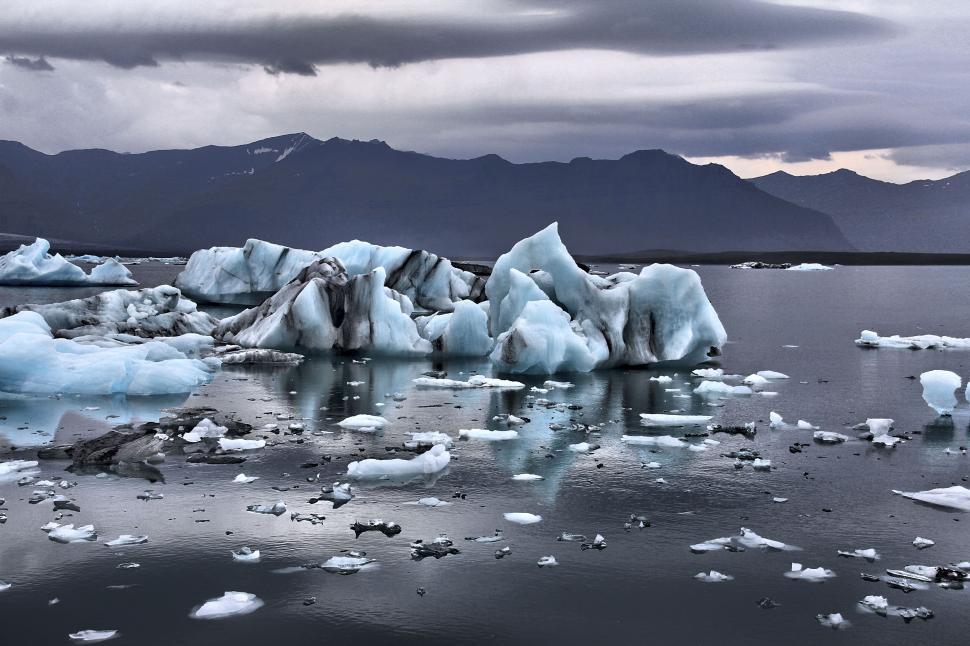 Free Image of Glacial icebergs floating in a chilly lake 