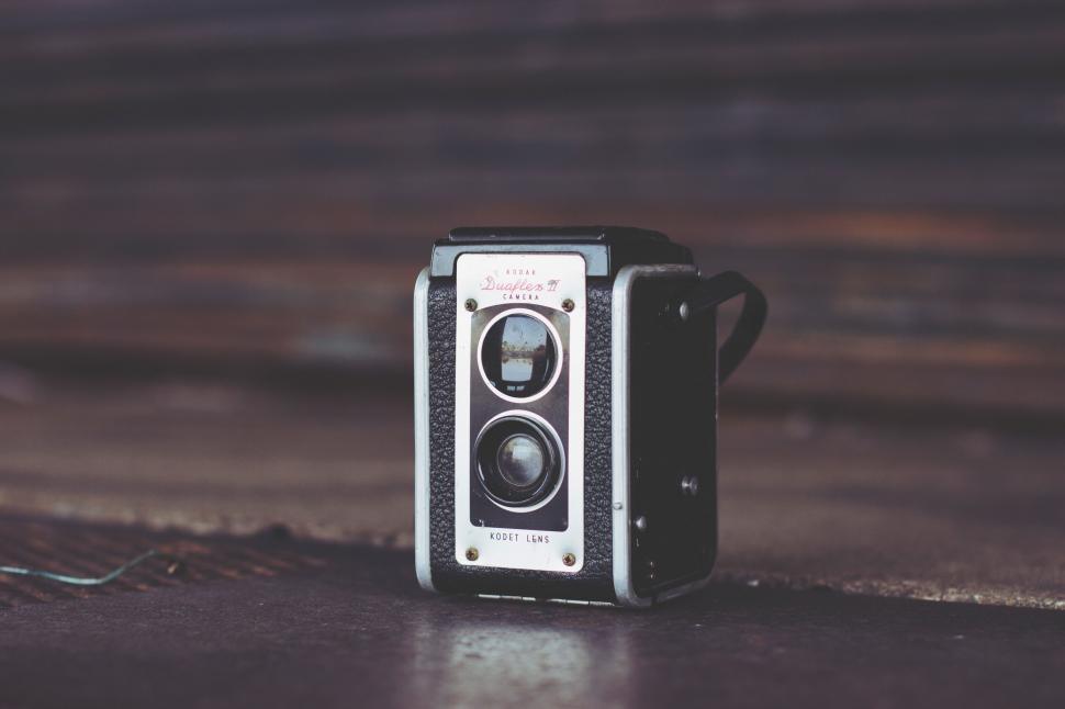 Free Image of Vintage Duaflex Camera on Wooden Surface 
