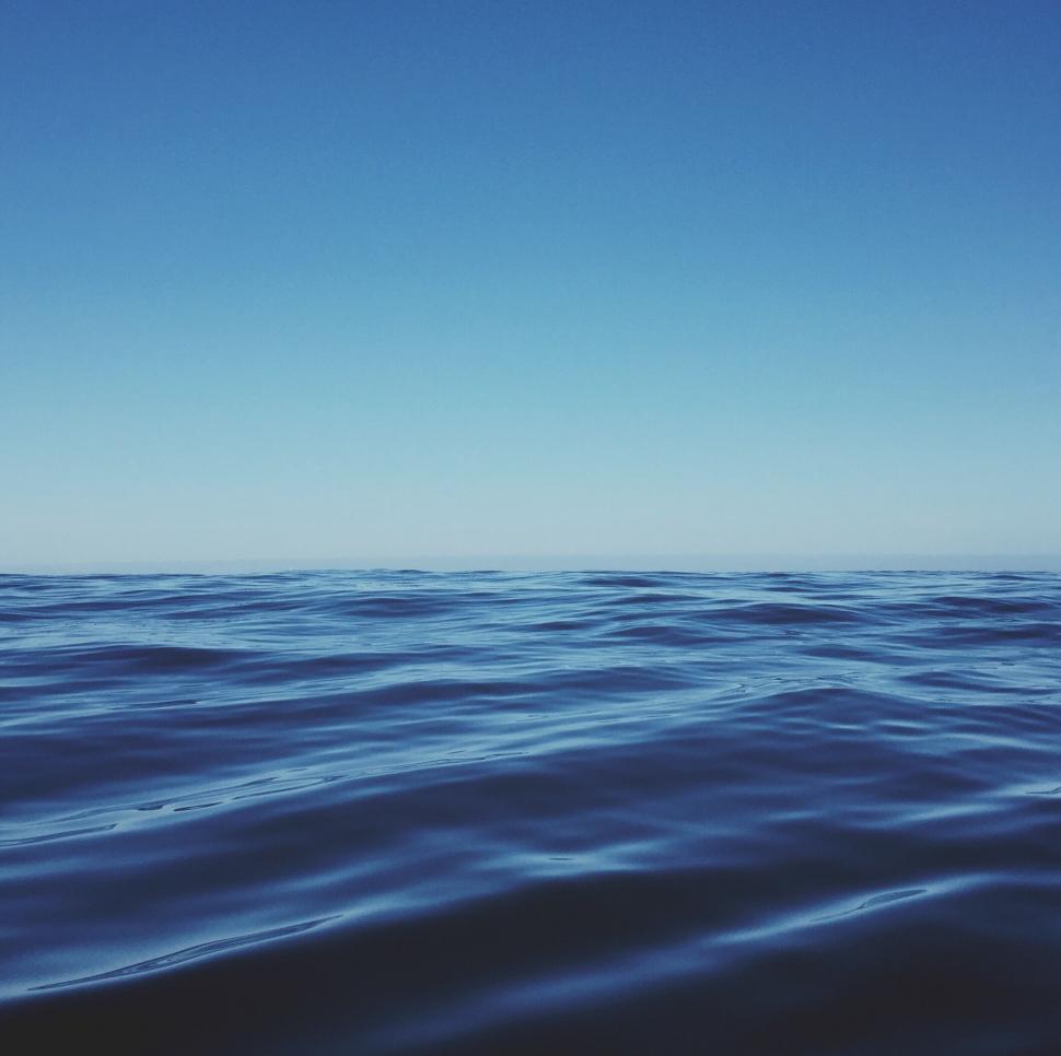 Free Image of Tranquil ocean water under blue sky 