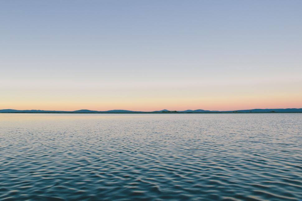 Free Image of Serene lake horizon at sunset 