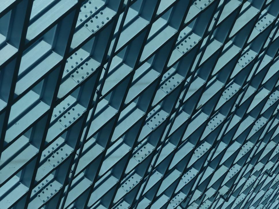 Free Image of Abstract pattern of a blue geometric facade 