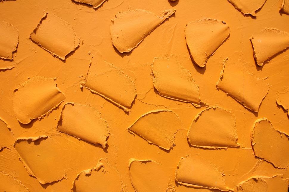 Free Image of Close-up of orange textured wall surface 