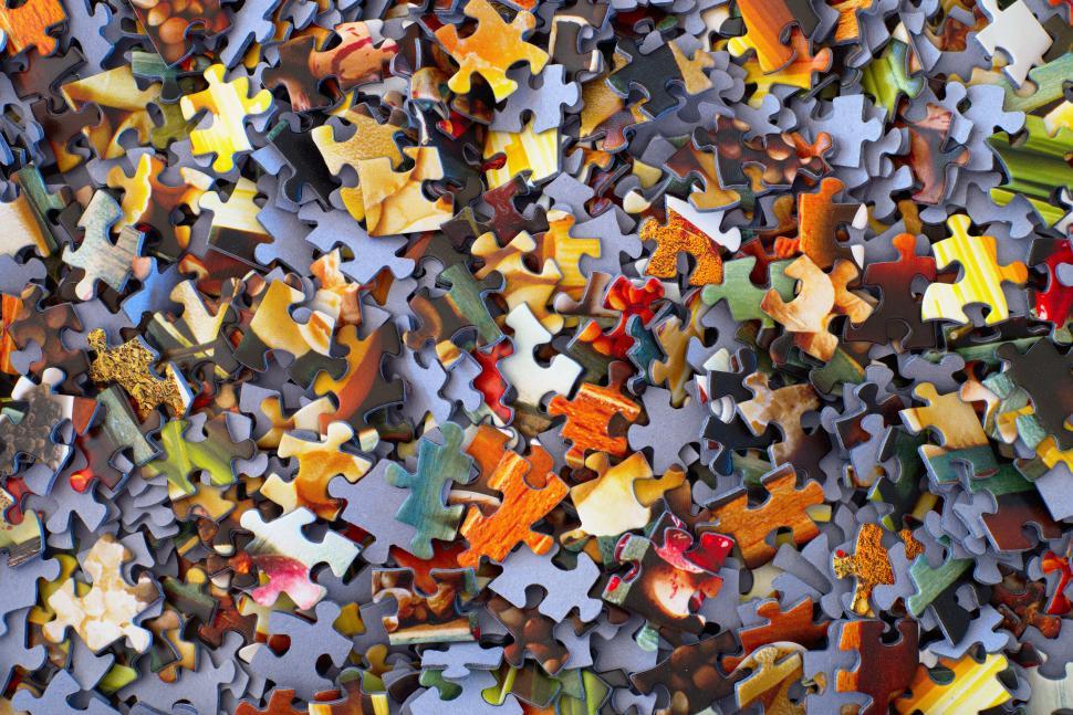 Free Image of Assorted jigsaw puzzle pieces close-up 